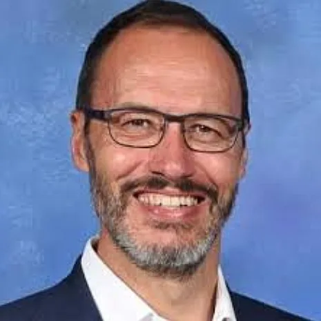 Head and shoulders photo of professor greg allen.