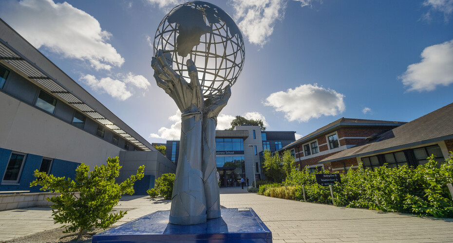 The 'In our hands' sculpture by Simon Ruscoe outside the Business School
