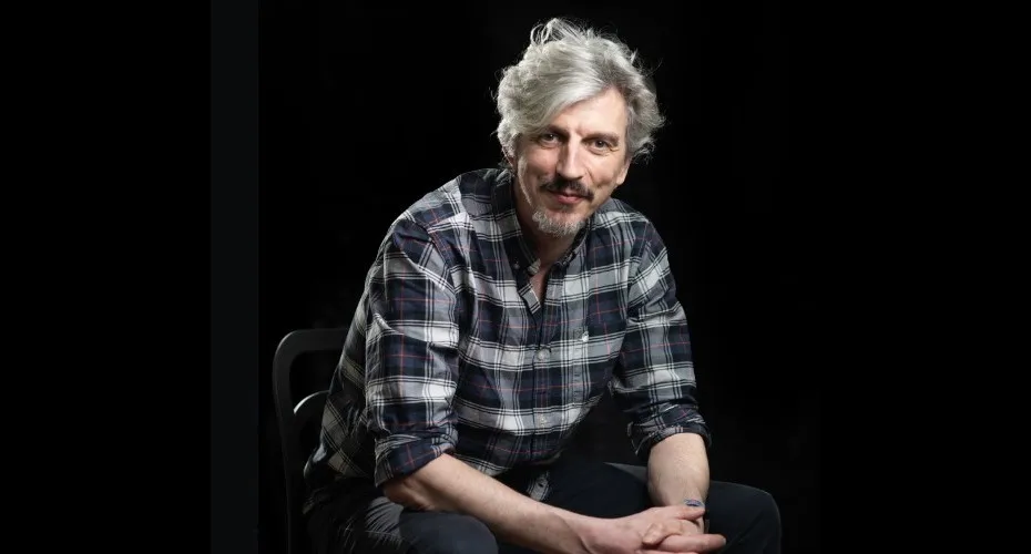 Head and shoulders photo of professor ben groom.