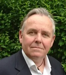 Head and shoulders photo of professor allen alexander.