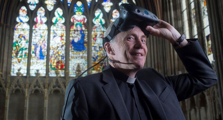 Canon Mike Williams trying technology at Exeter Cathedral
