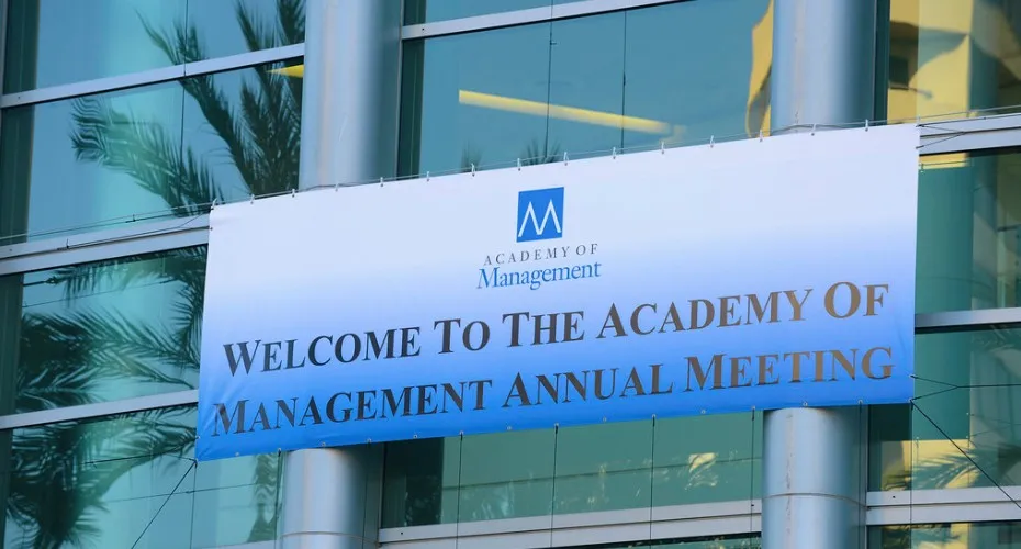 Banner at pennsylvania convention center welcoming attendees to the academy of management annual meeting.