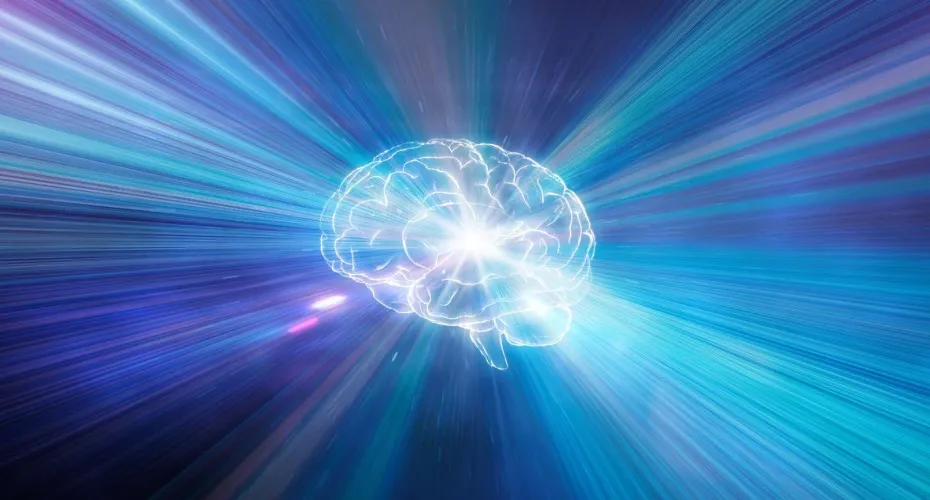 A brain surrounded by radiating light rays, representing inspiration and intellectual energy.