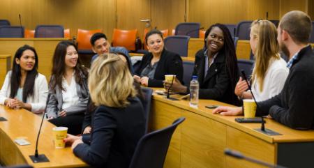 Students talking at a conference