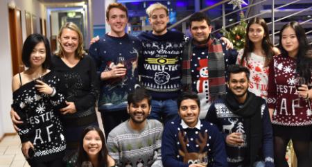 Students at a Christmas party waering their best jumpers