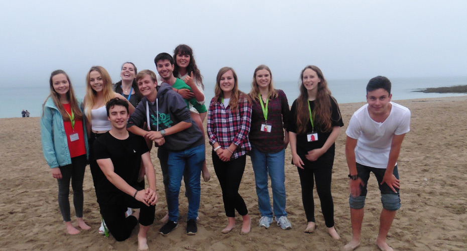 Students on a cornwall beach